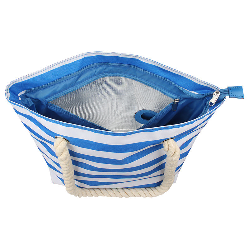 Insulated carrying bag with drink outlet
